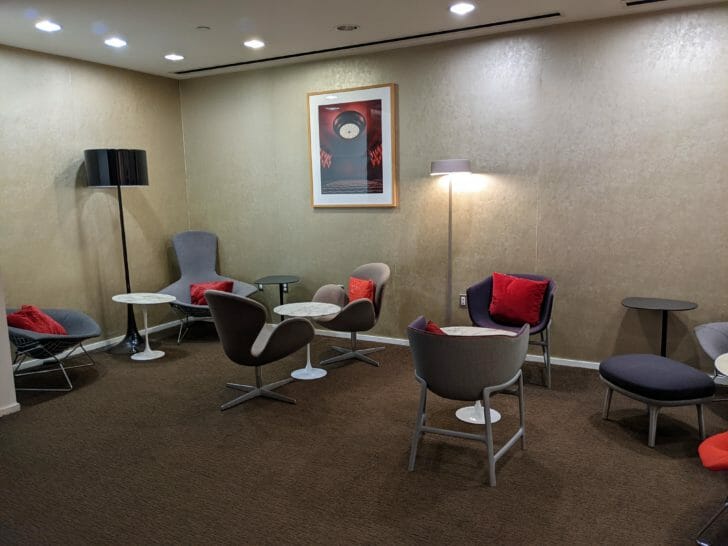 a room with chairs and tables