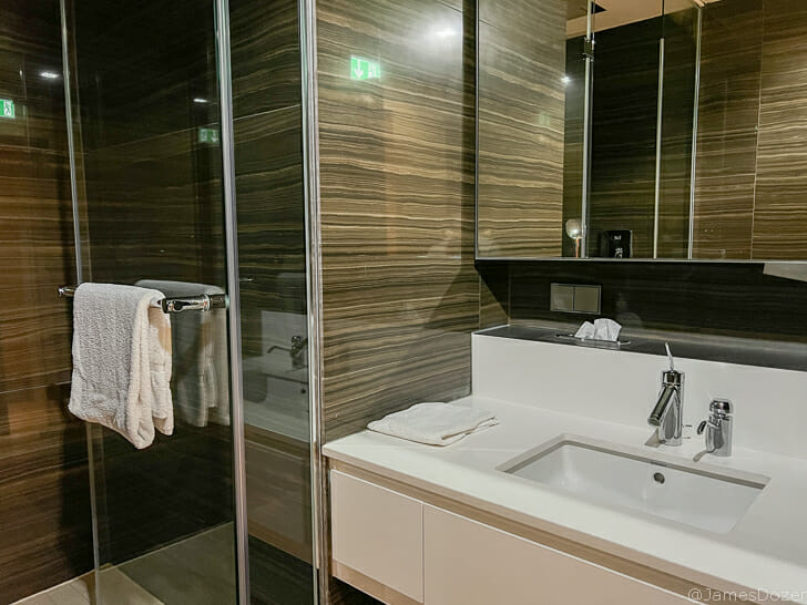 a bathroom with a mirror and sink