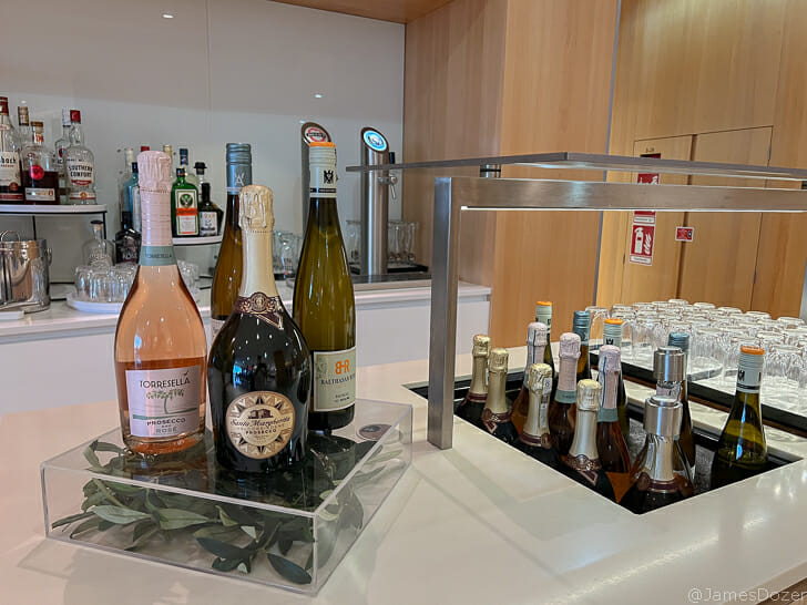 a group of bottles of wine on a counter