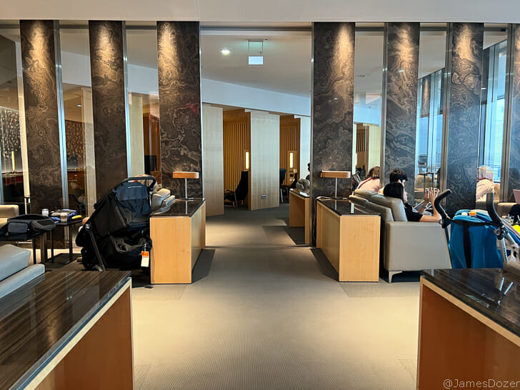 a group of people sitting in a lobby