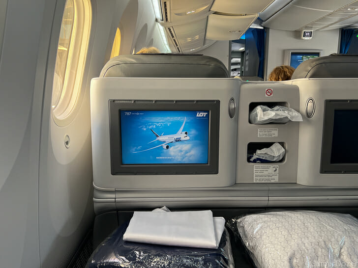 a screen on the side of an airplane