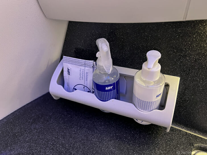 a soap and a lotion in a holder
