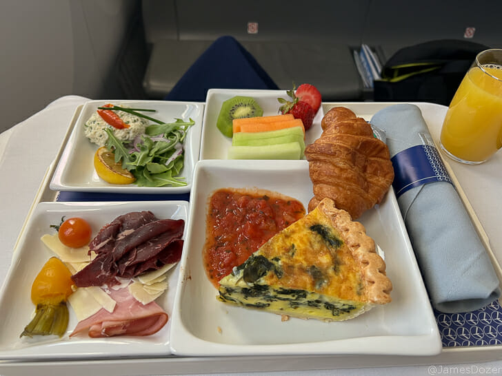 a tray of food on a plane