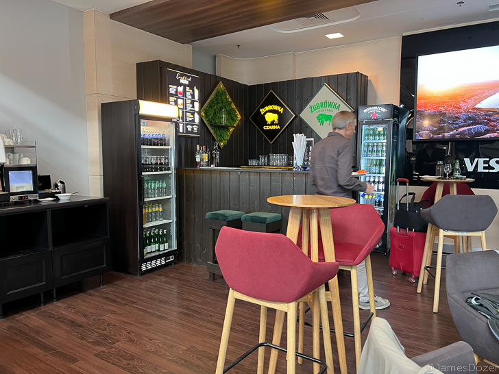 a man standing at a bar