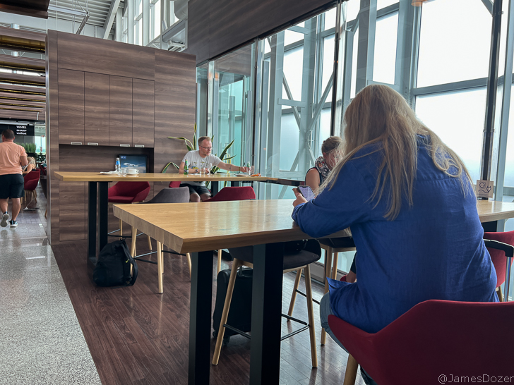 a group of people sitting at tables