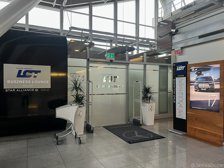 a room with glass walls and signs