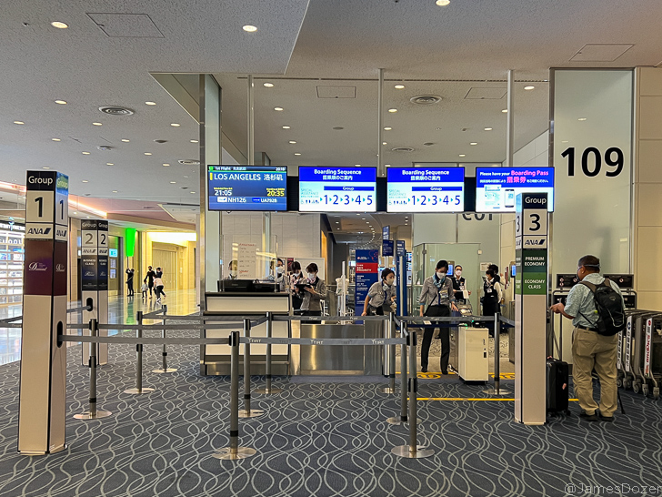people standing in a terminal