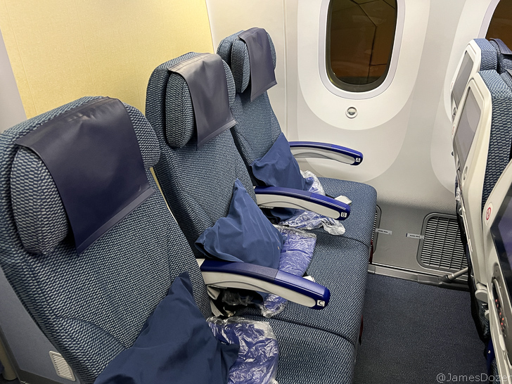 a seat with pillows on it