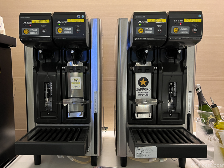 two machines with a lid open