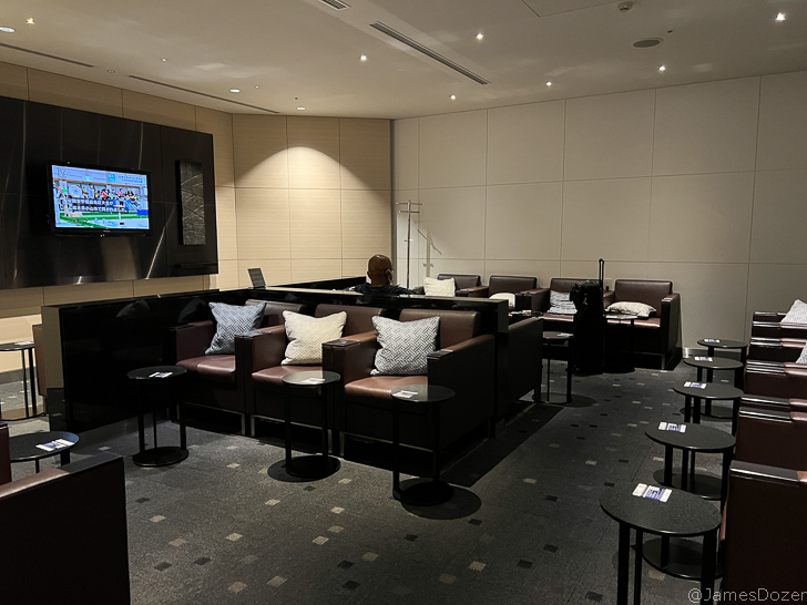a room with couches and chairs