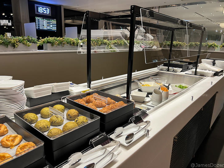 food in containers on a counter