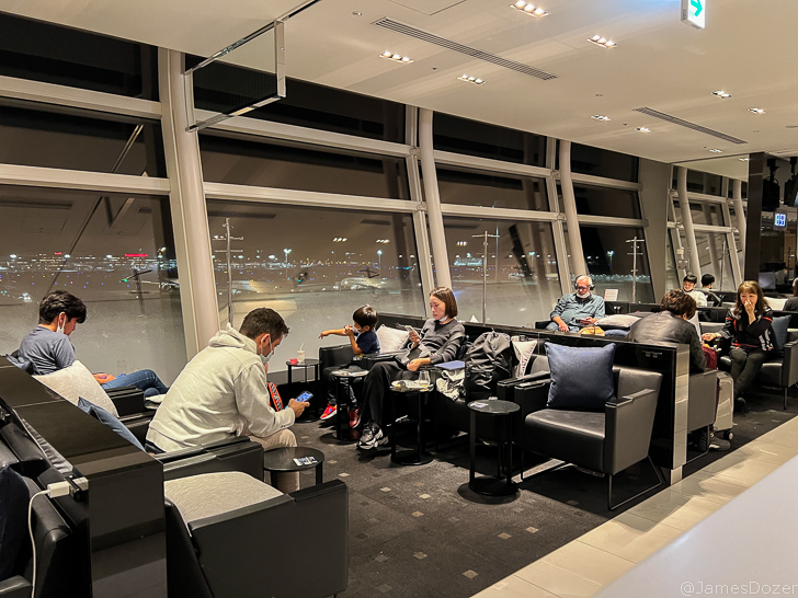 people sitting in a lounge area