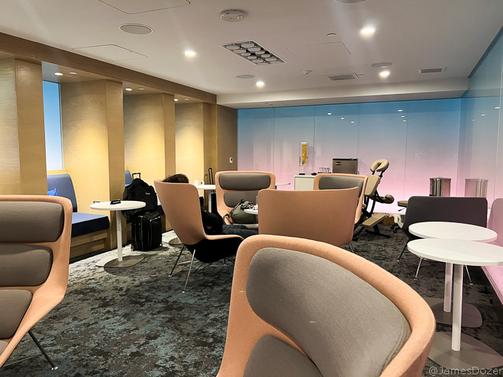 a room with chairs and tables
