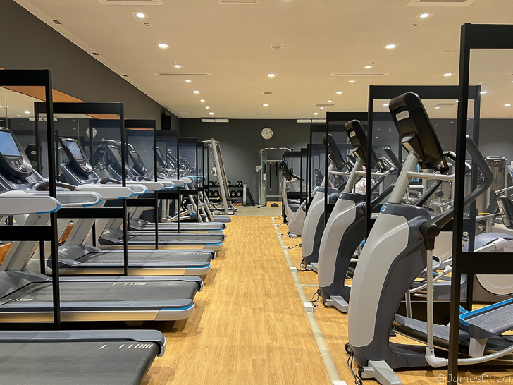 a room with treadmills and treadmills