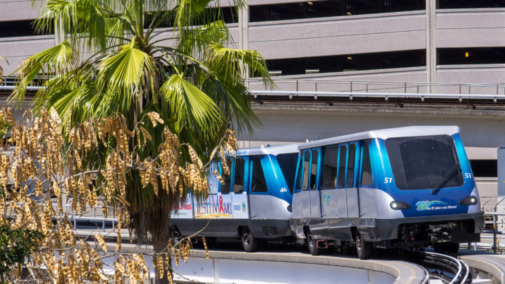 a two trains on a street