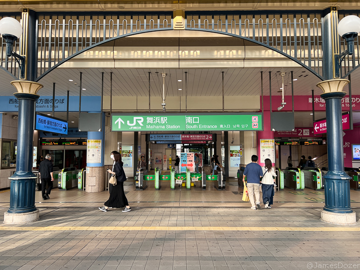 people walking in a train station