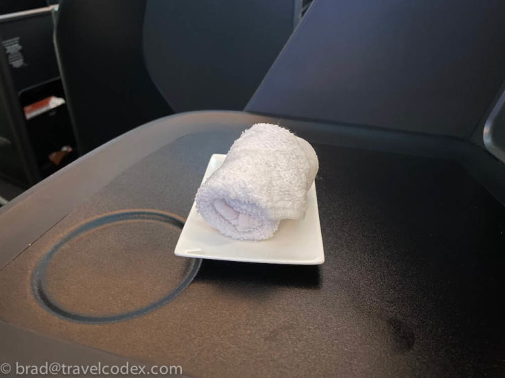 a white towel on a plate