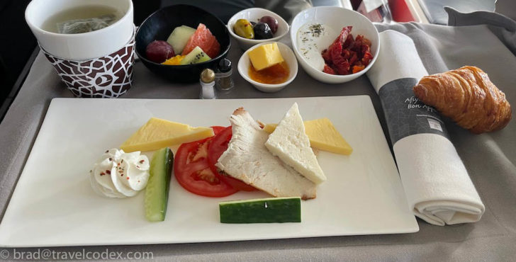 a plate of food on a tray