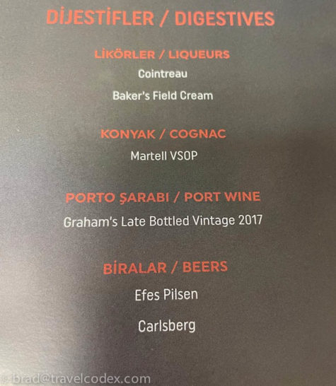 a menu with red text