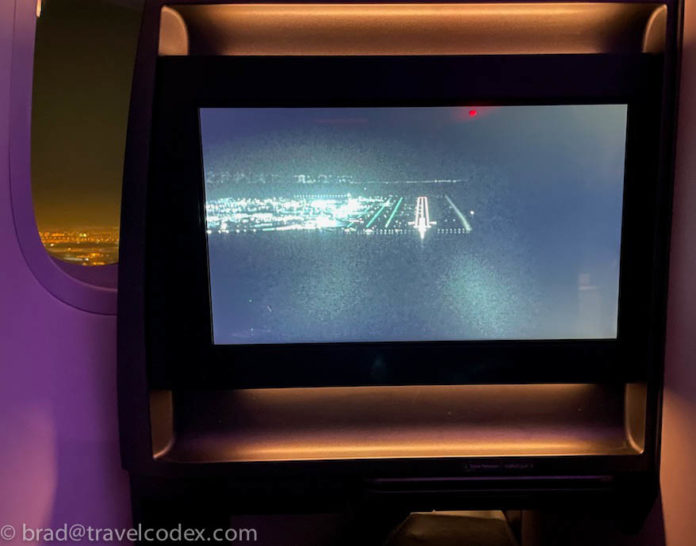 a screen with a city on it