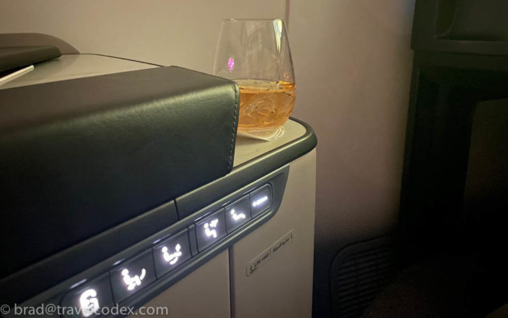 a glass of alcohol on a table