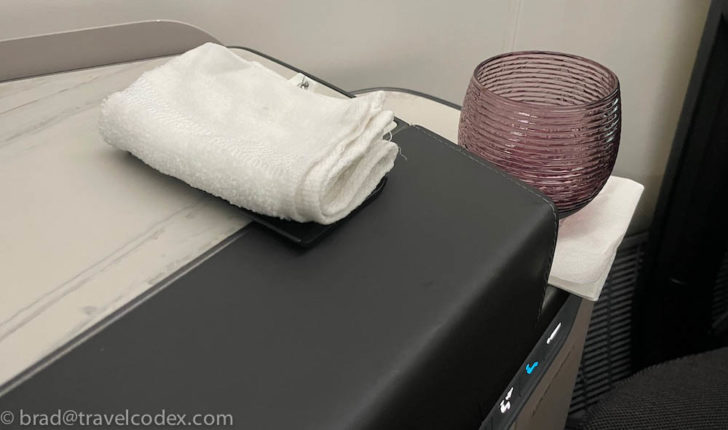 a white towel on a black surface
