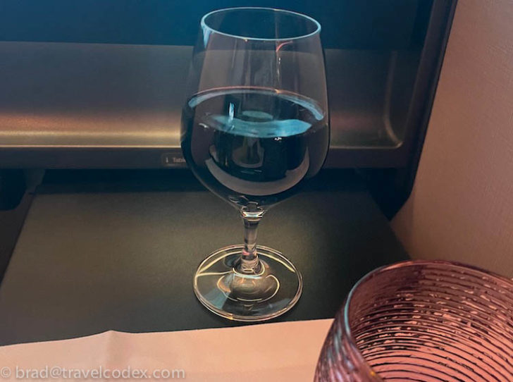 a glass of wine on a table