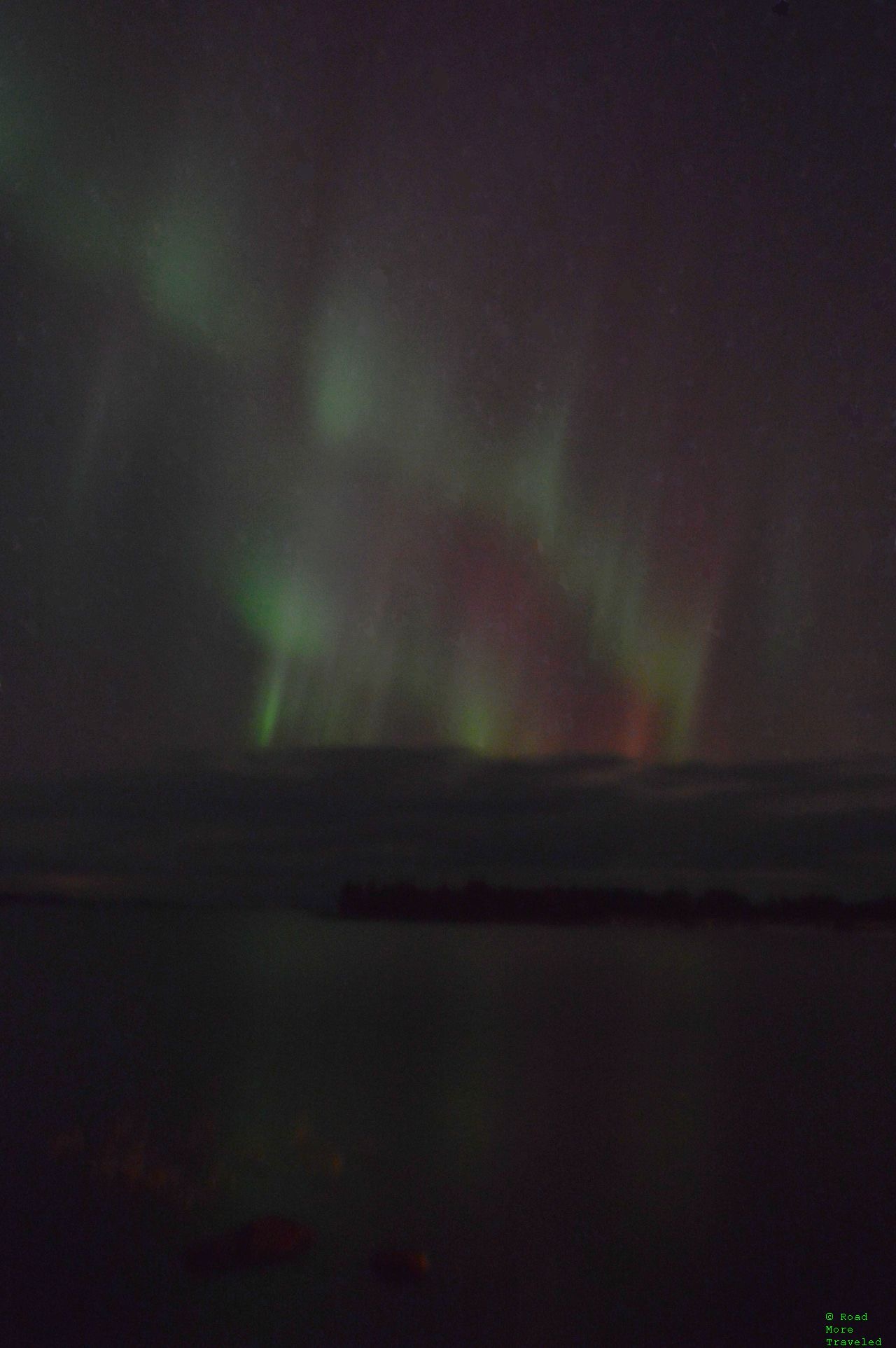 Northern lights with orange and red