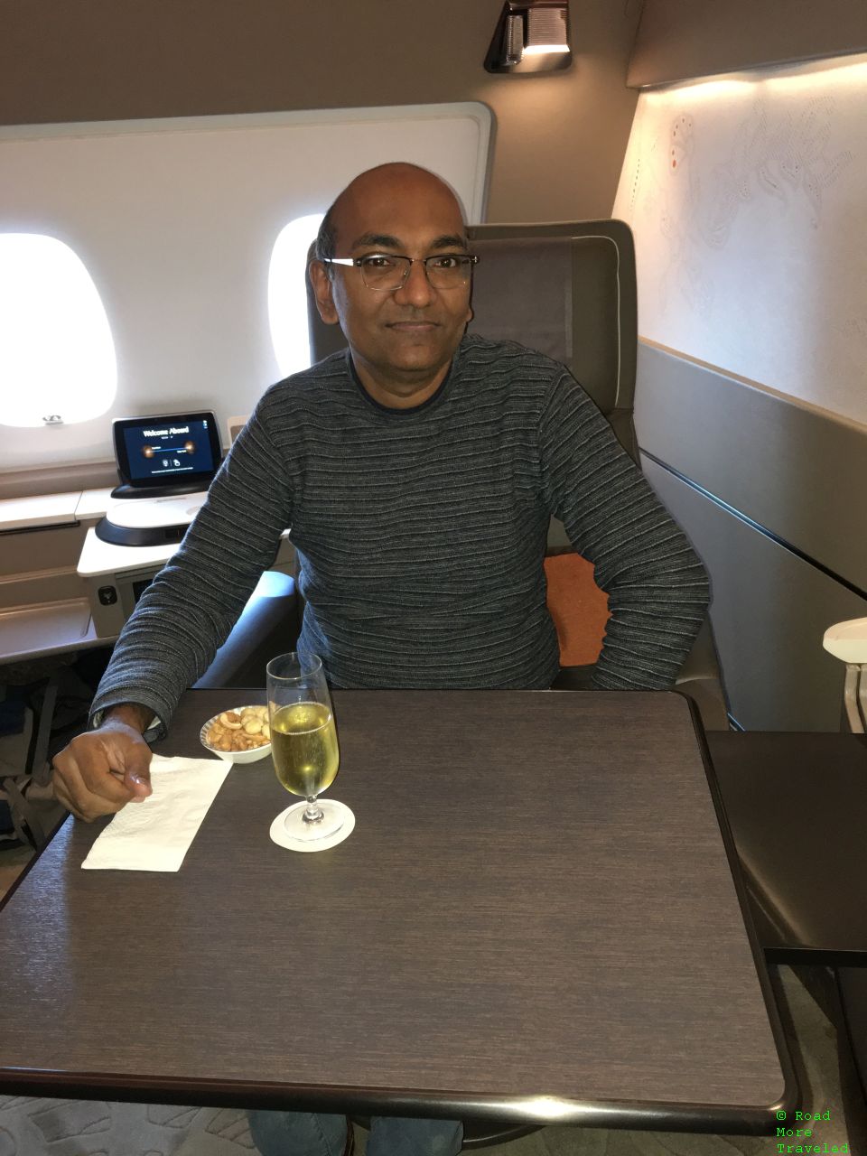 Singapore Airlines A380 Suites Class - pre-departure beverage and nuts