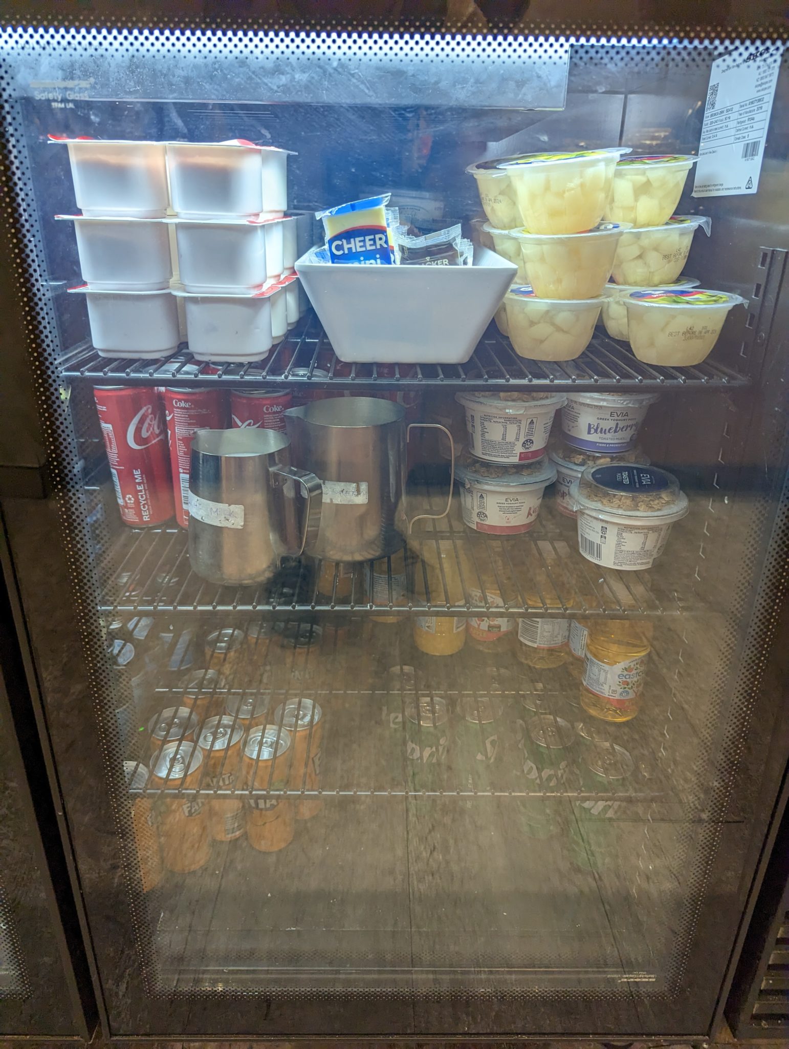 a refrigerator with food in it