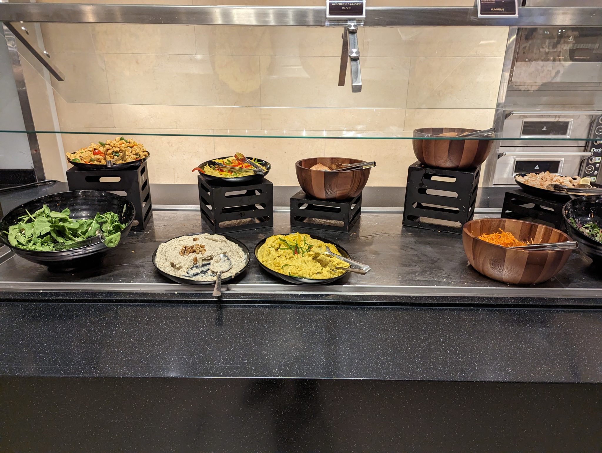 food in bowls on a counter