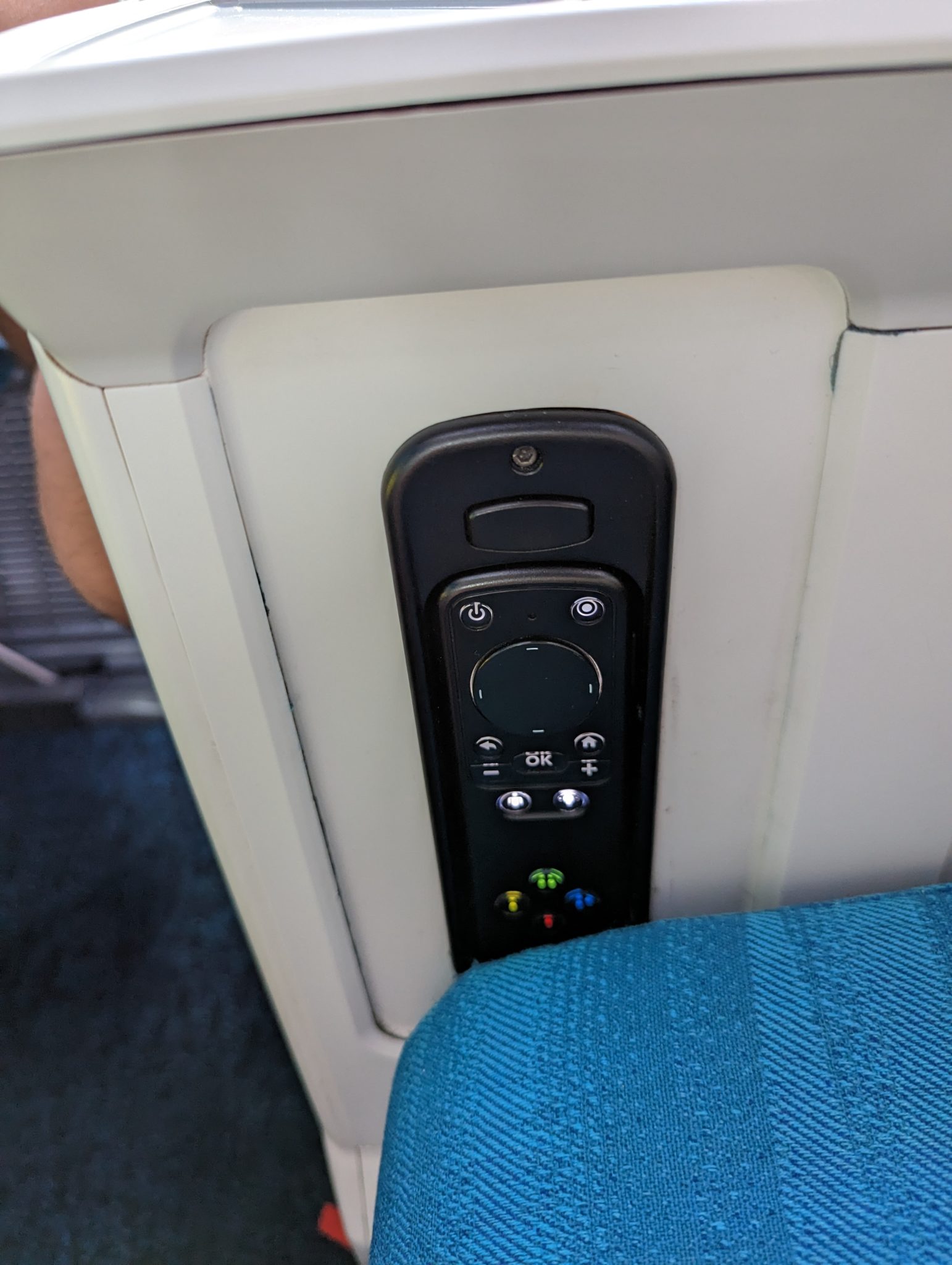 a remote control on a seat