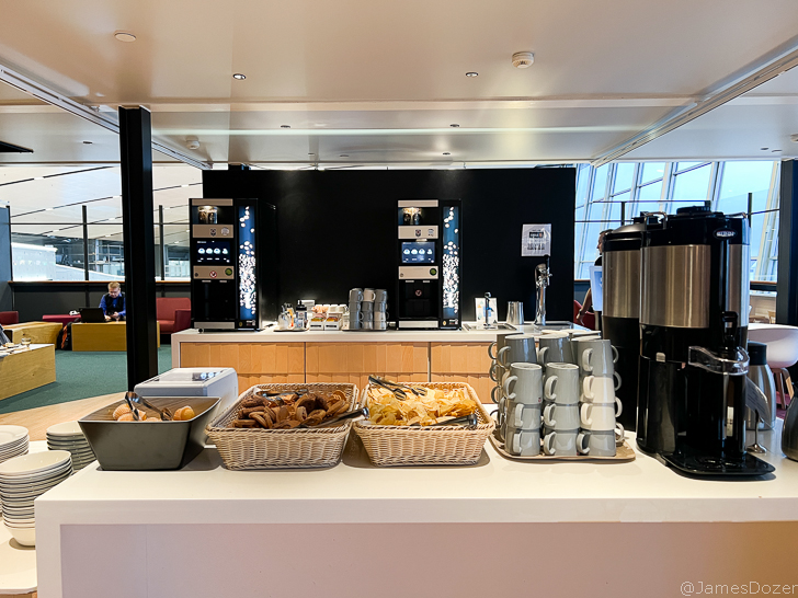 a coffee machine and food on a counter