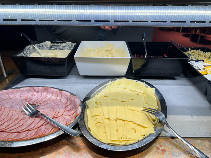 a trays of food with forks