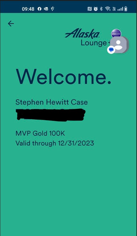 a green card with a black text and a black pen