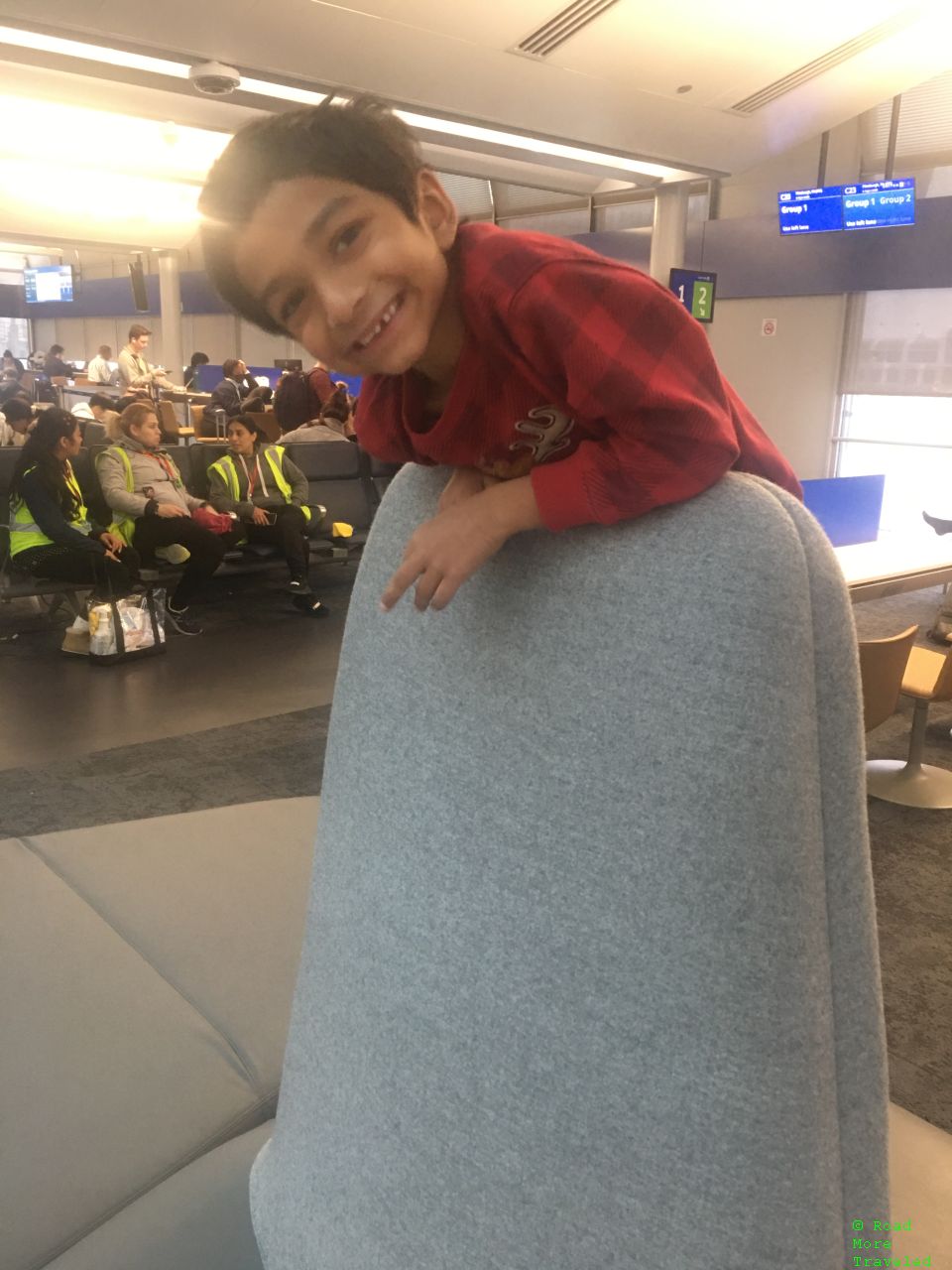 Climbing on sofas in ORD Terminal 1 gate area