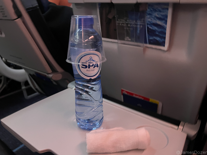 a bottle of water on a table