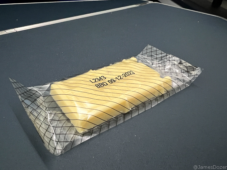 a package of cheese on a table
