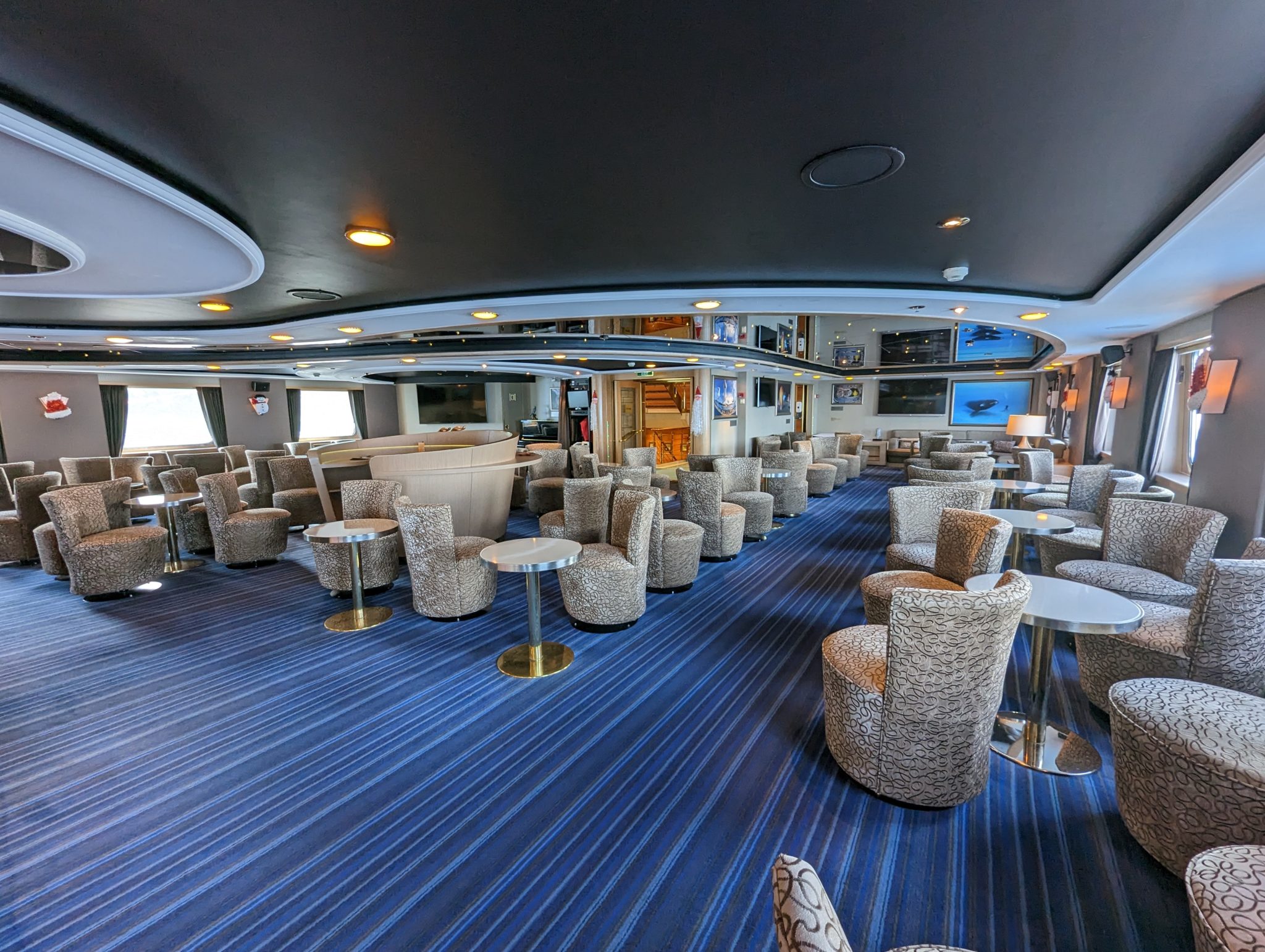 a room with chairs and tables
