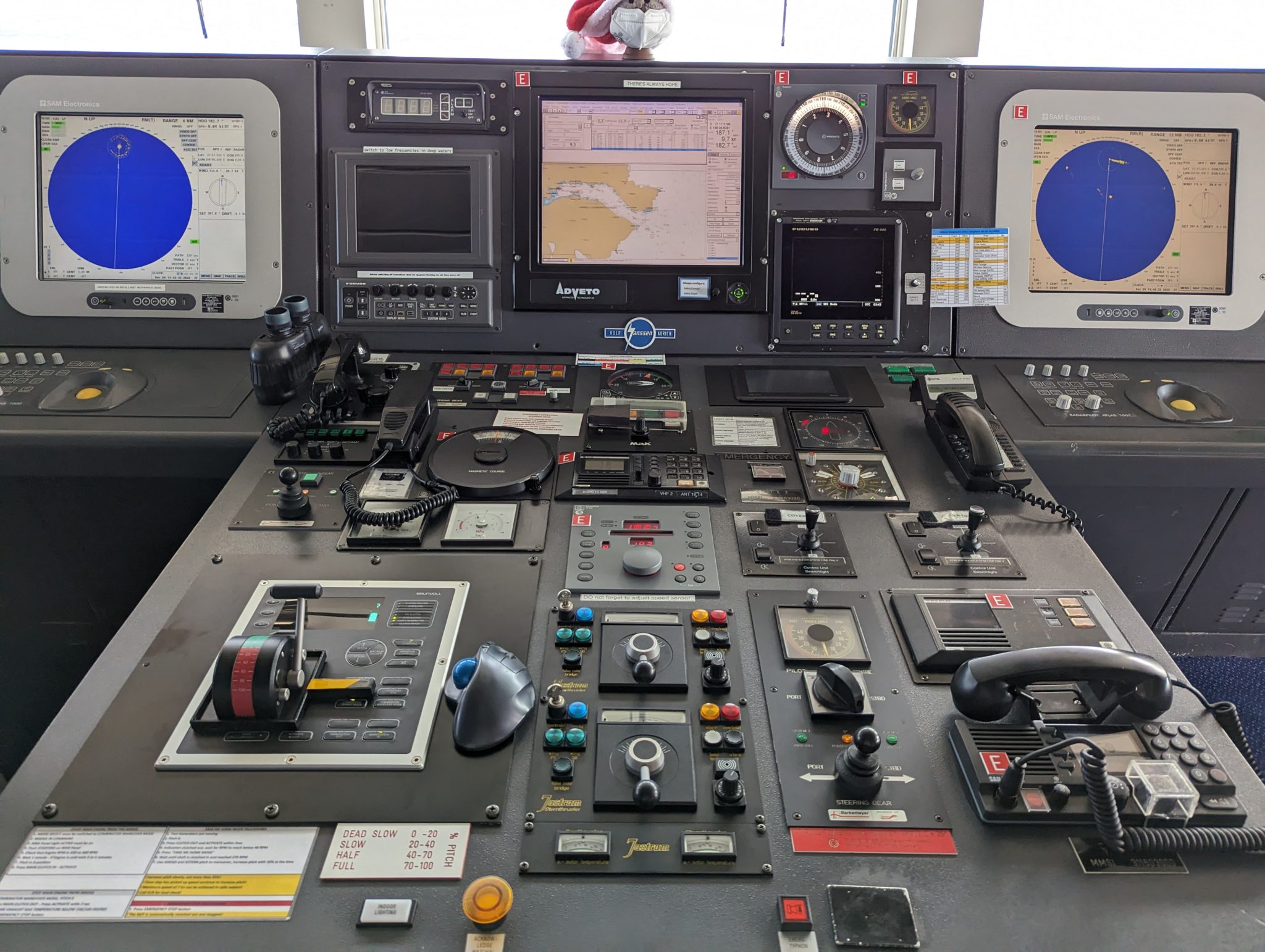 a control panel with many buttons and switches