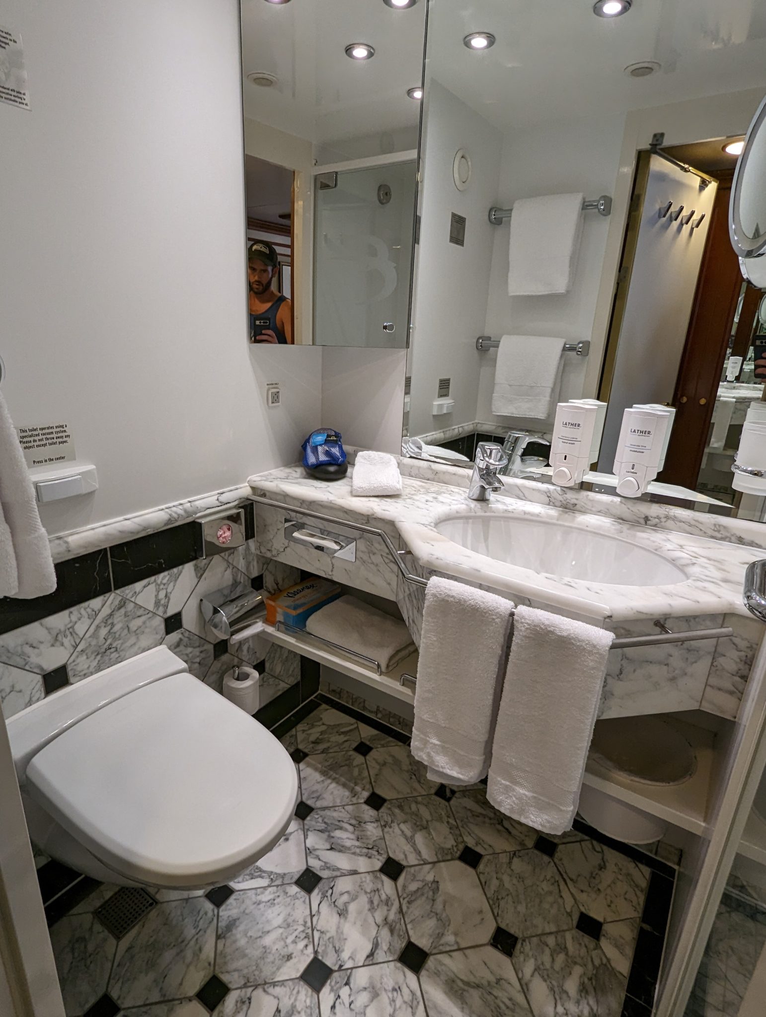 a bathroom with a sink and toilet
