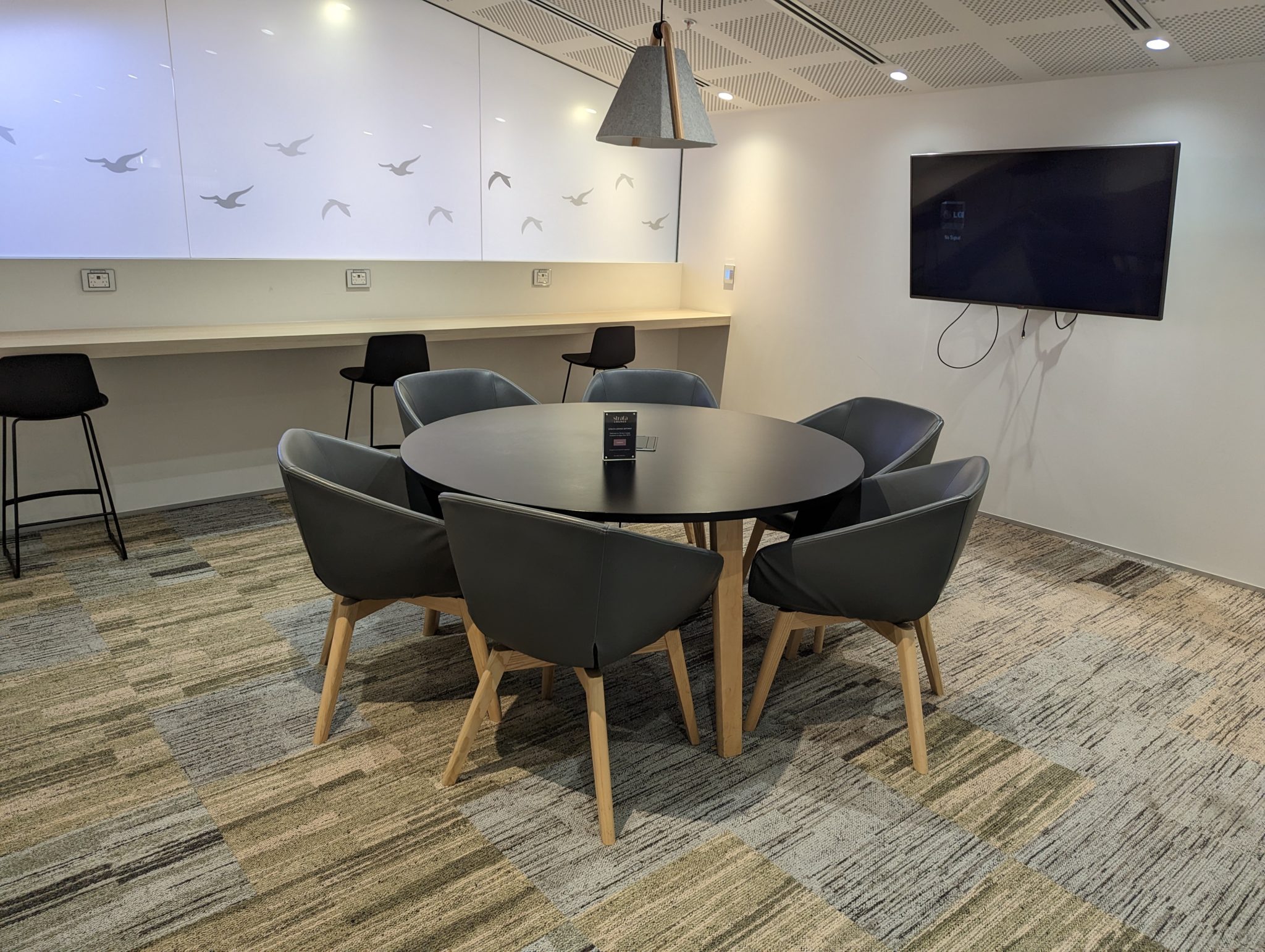 a room with a table and chairs