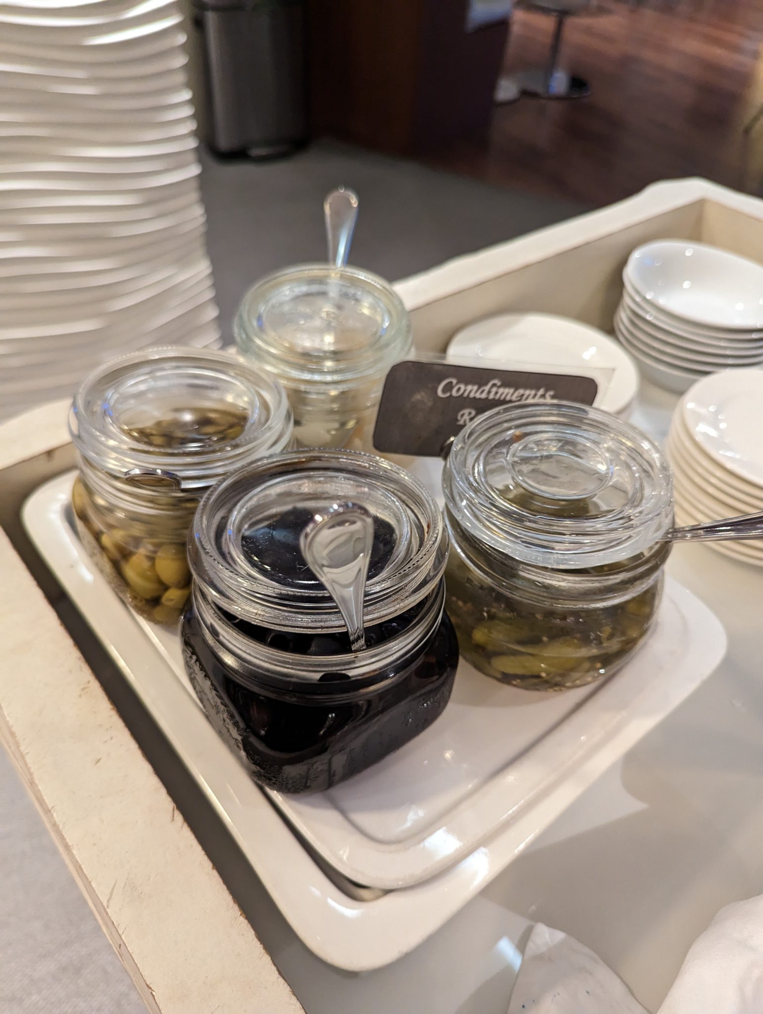 a tray of condiments and sauces