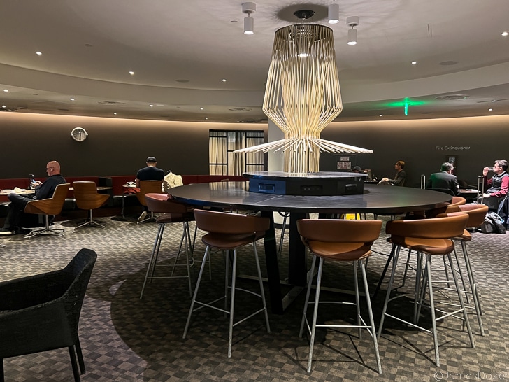 a room with a table and chairs