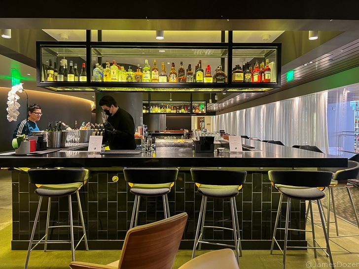 a man behind a bar