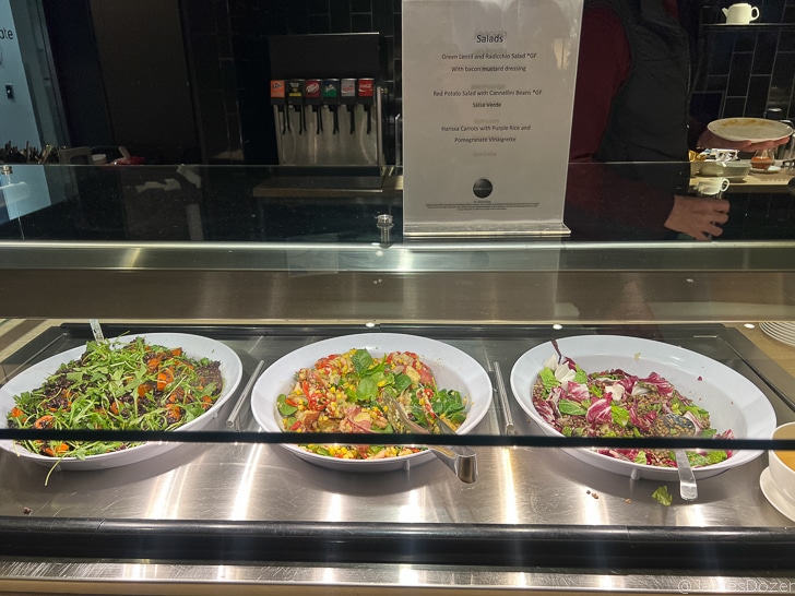 bowls of salads in a row