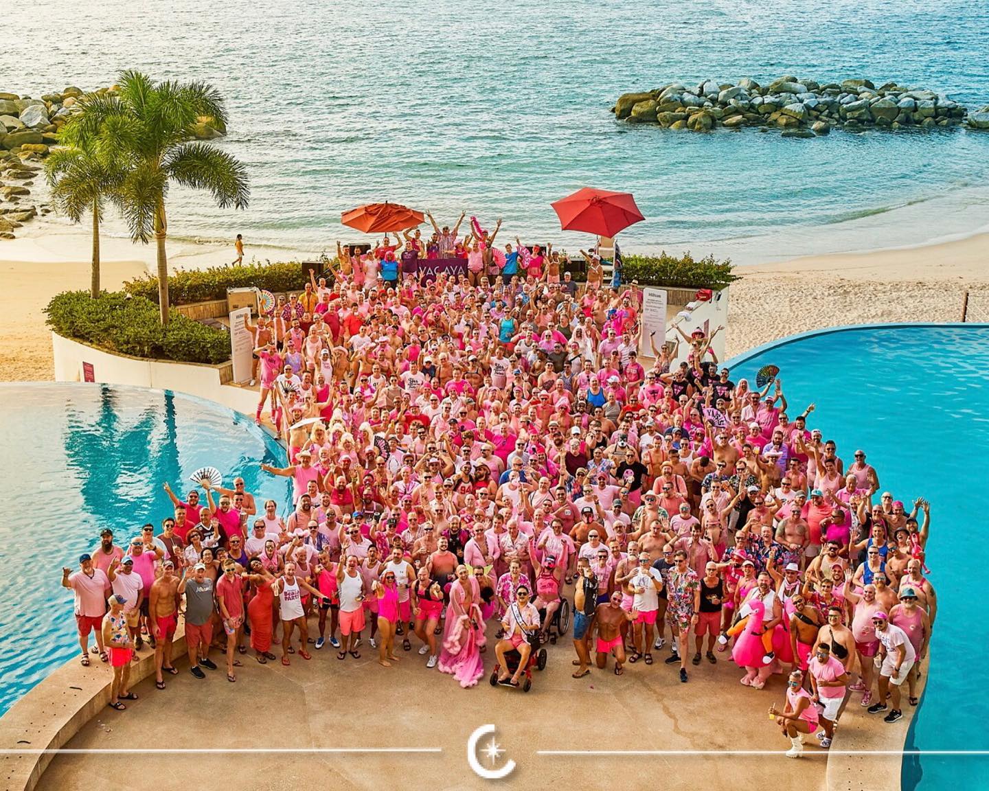 a group of people in pink