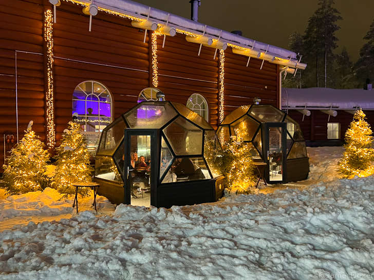 a building with snow and lights