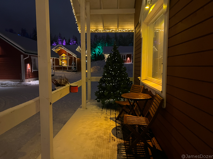 a christmas tree on a porch