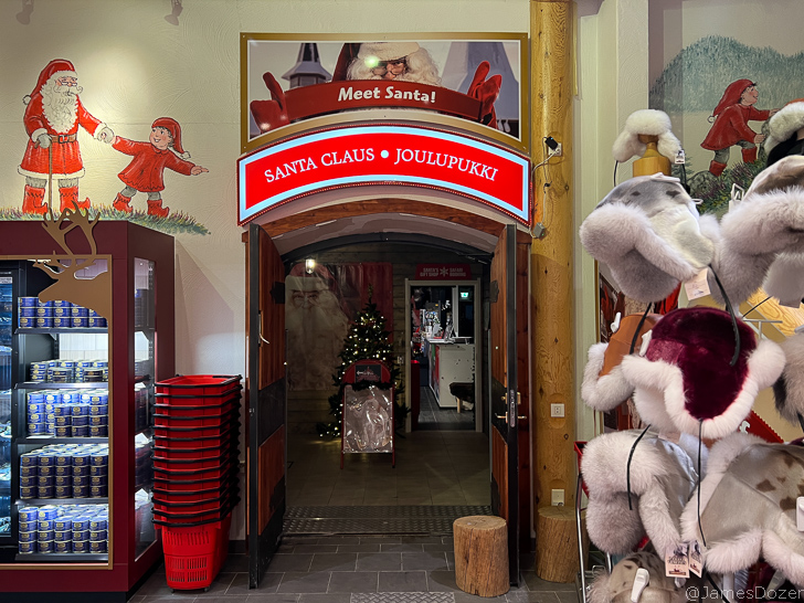 a store with a sign and stuffed animals